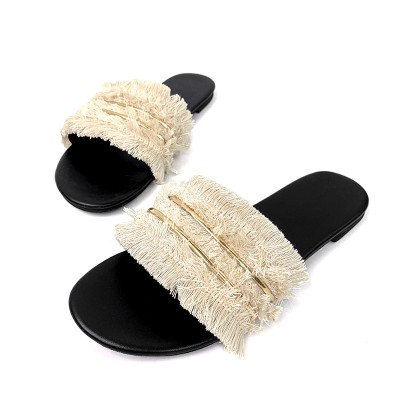 Round toe tassel decorated women's flat slippers