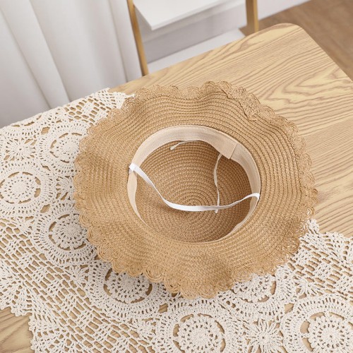 Women's woven straw hat with bow tie and wide brim