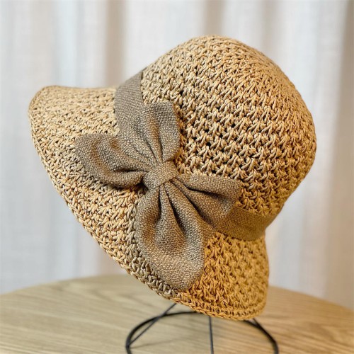 Women's woven straw hat with bow decoration