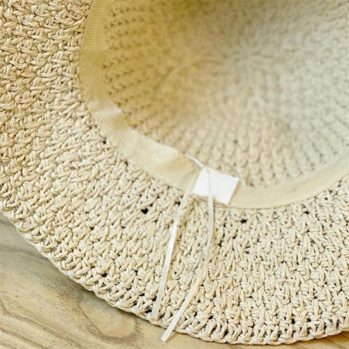 Women's woven straw hat with bow decoration