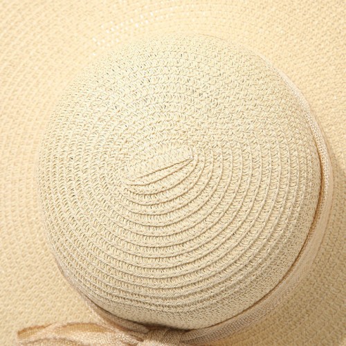 Women's woven straw hat with wide brim and bow