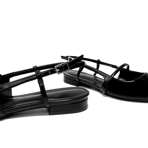 Women's black pointed toe button-down flat sandals